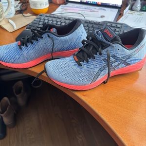 Unworn ASICS trainers